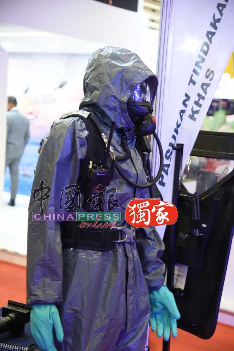 8058079-1 ▲▼馬來西亞警方破獲台灣販毒集團,出動掃毒精英部隊攻堅。(圖/馬來西亞中國報提供)