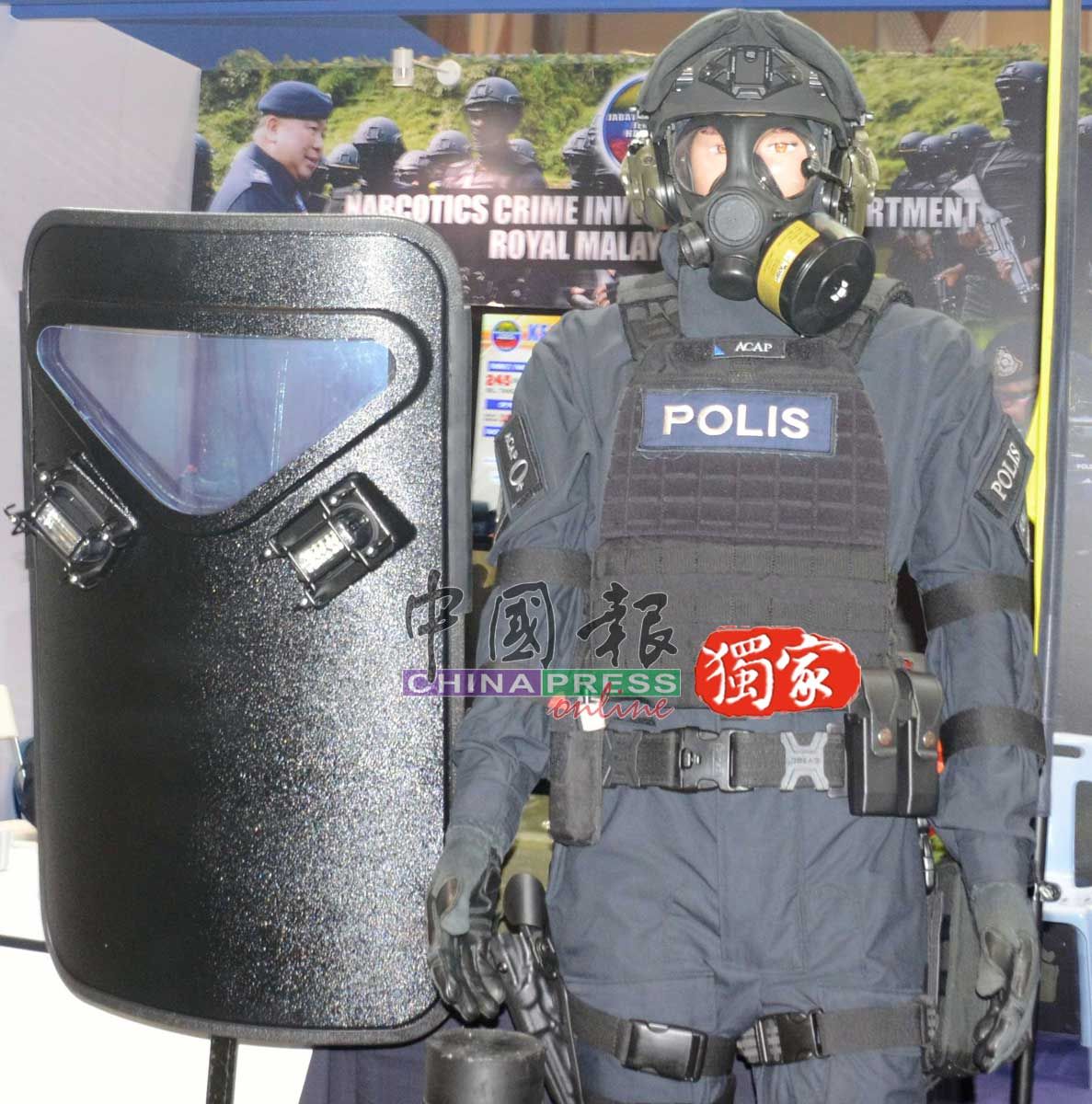 8058080-1 ▲▼馬來西亞警方破獲台灣販毒集團,出動掃毒精英部隊攻堅。(圖/馬來西亞中國報提供)