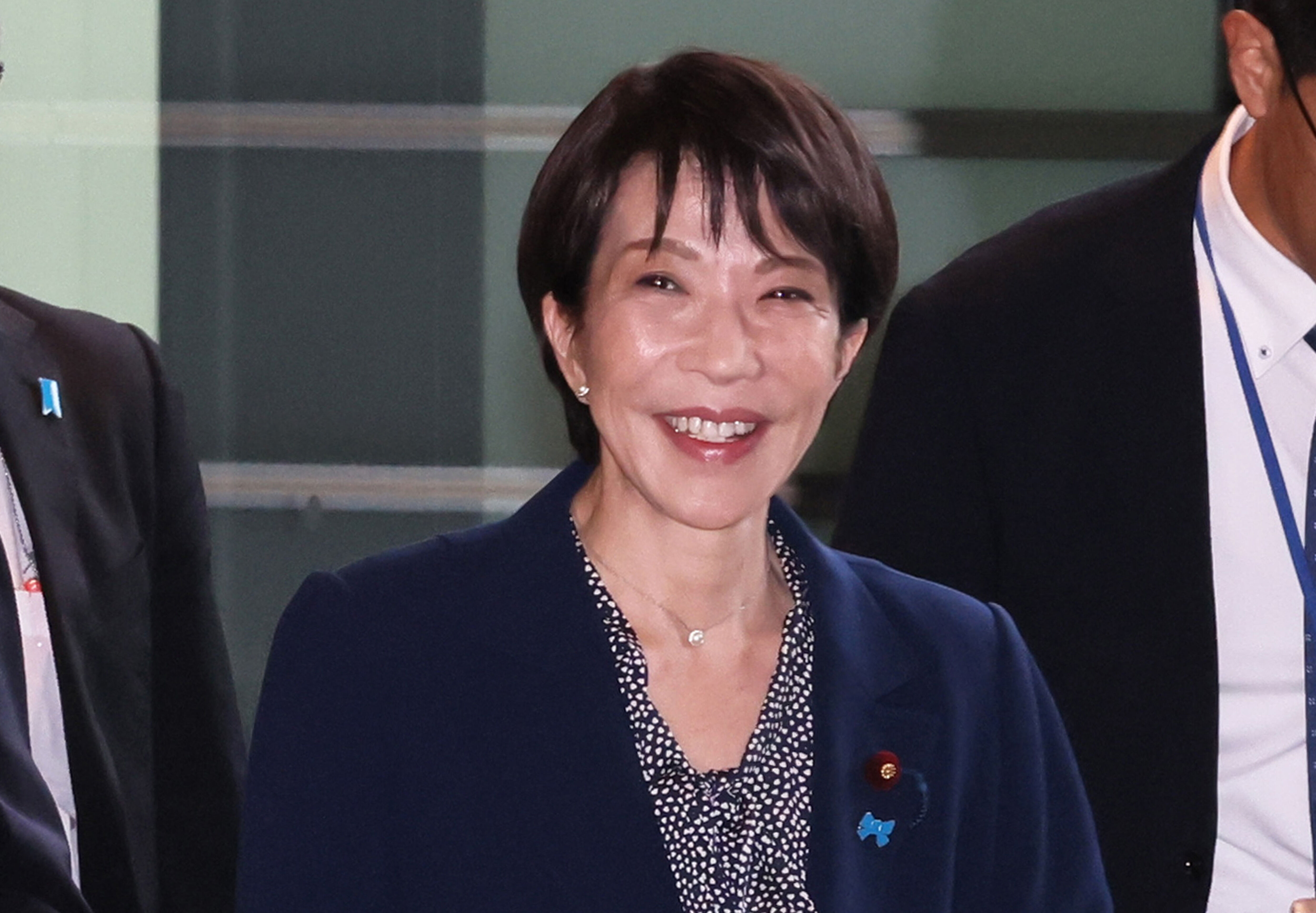 8464676-1 ▲▼日本首相高市早苗27日返抵位於東京的總理大臣官邸。(圖/達志影像/美聯社)