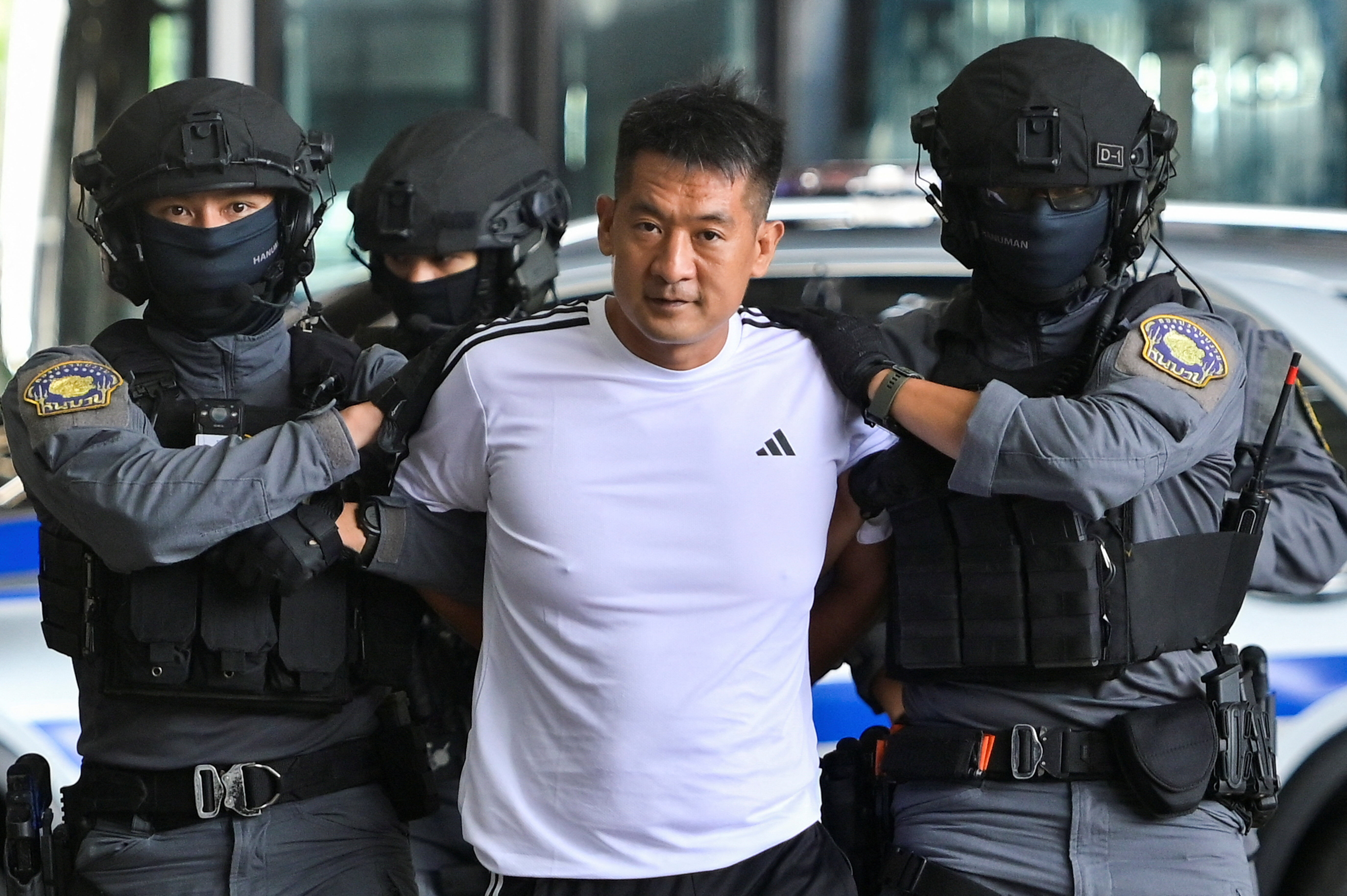 8489155-1 ▲ 佘智江今由泰國警方押送登機。(圖/路透)