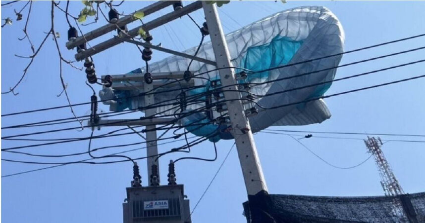 美滑翔傘客受困泰國高壓電線桿！全島停電1小時成功救援