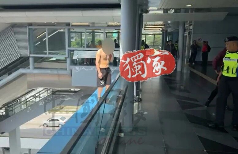▲▼一名30多歲台灣男子在隆市美達花園捷運站突然情緒失控，半裸翻越天橋欄杆，疑似有輕生意圖。（圖／翻攝自中國報）