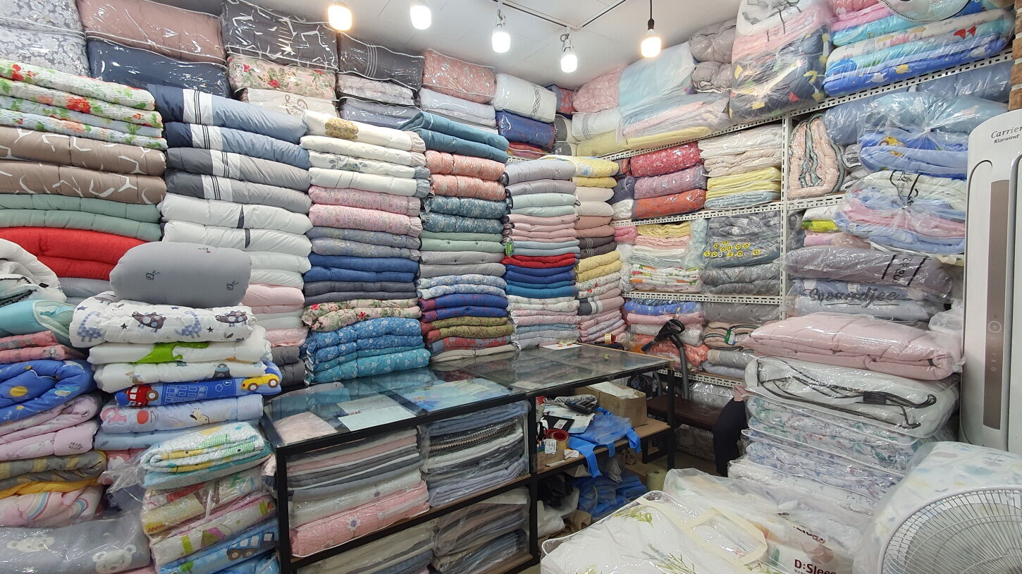 8670640-1 ▲▼台灣人常去廣藏市場買棉被。(圖/翻攝自gjmarket.org)