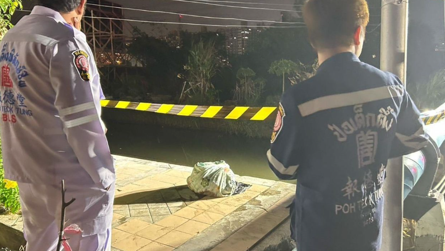 8673419-1 ▲▼手提頭顱畫面曝!寮國男分屍殘殺女友 「8袋人肉塊」沿路丟。(圖/Facebook/THAI PRESS)