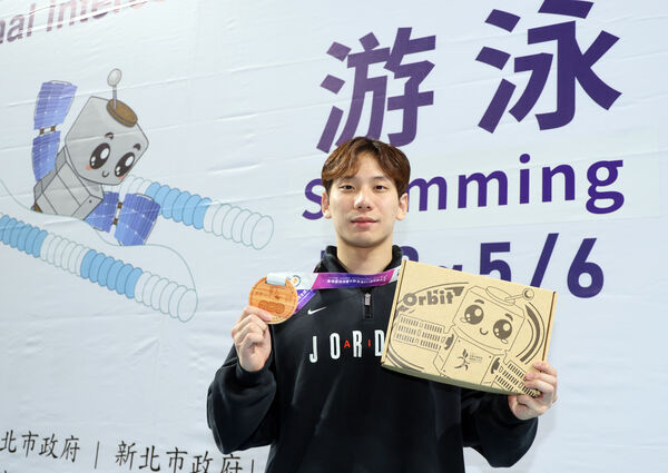 d8726208 ▲王冠閎在全大運100公尺蝶式決賽破全國紀錄。(圖/全大運辦公室提供)